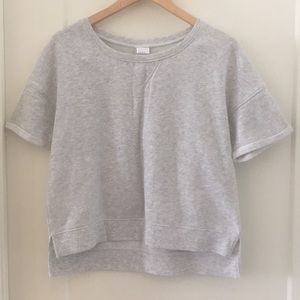 Stars above roll sleeve sweatshirt top